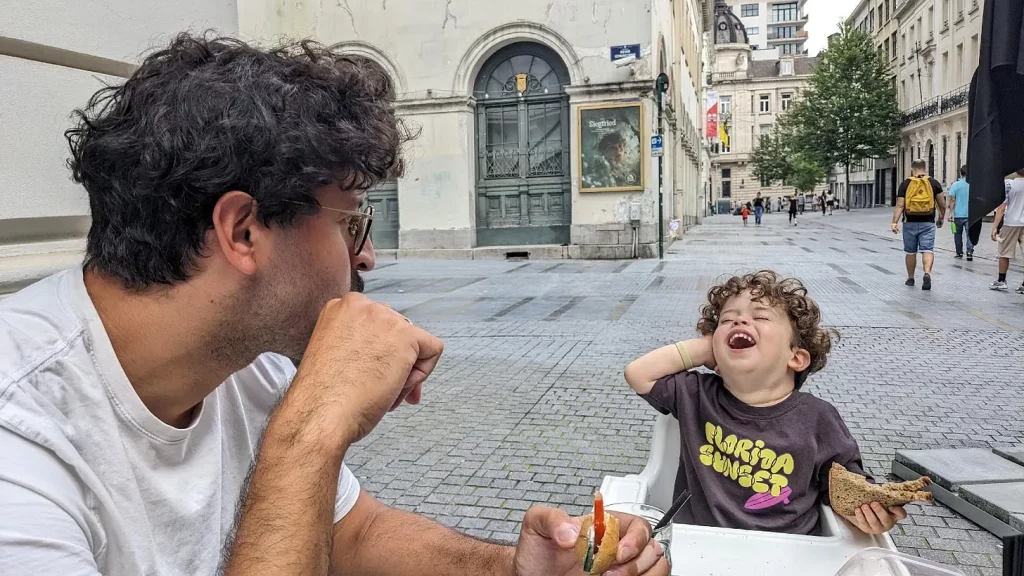 A person and child sitting in a chair
AI-generated content may be incorrect.